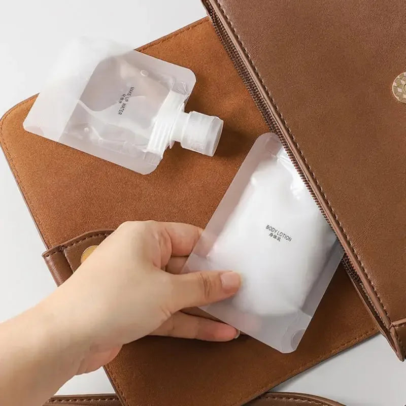 30/50/ML Lotion Dispenser Bag Travel Reusable Pouches Shampoo Liquid