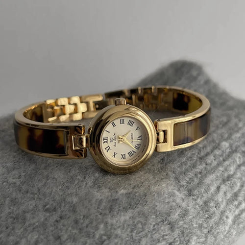 Fashion ethos Minimalist luxury gold disc with quartz women's watch